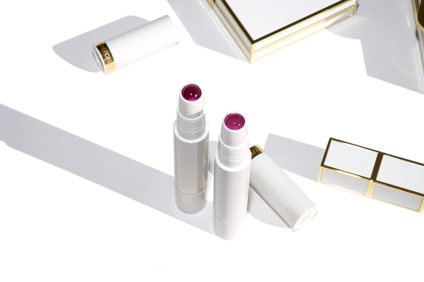 Tom Ford Lip Slicks swatches Hibiscus Kiss and Bitten Berry