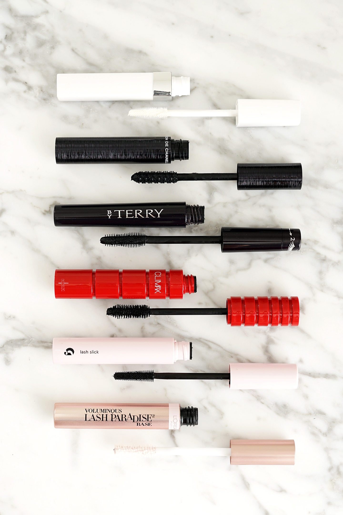Mascara + Primer Roundup Chanel La Base Mascara, Chanel Le Volume Revolution de Chanel, By Terry Lash-Expert, NARS Climax, Glossier Lash Slick and L'Oreal Voluminous Lash Paradise Base