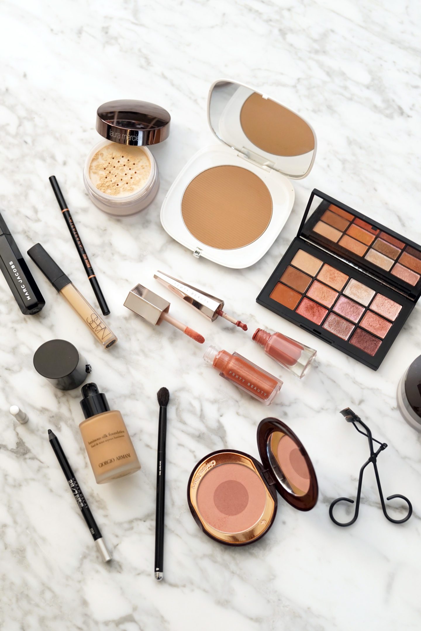 NARS Ignited Eyeshadow, Fenty Glow, Fenty Stunna Lip Paint Uncuffed, Armani Luminous Silk Foundation