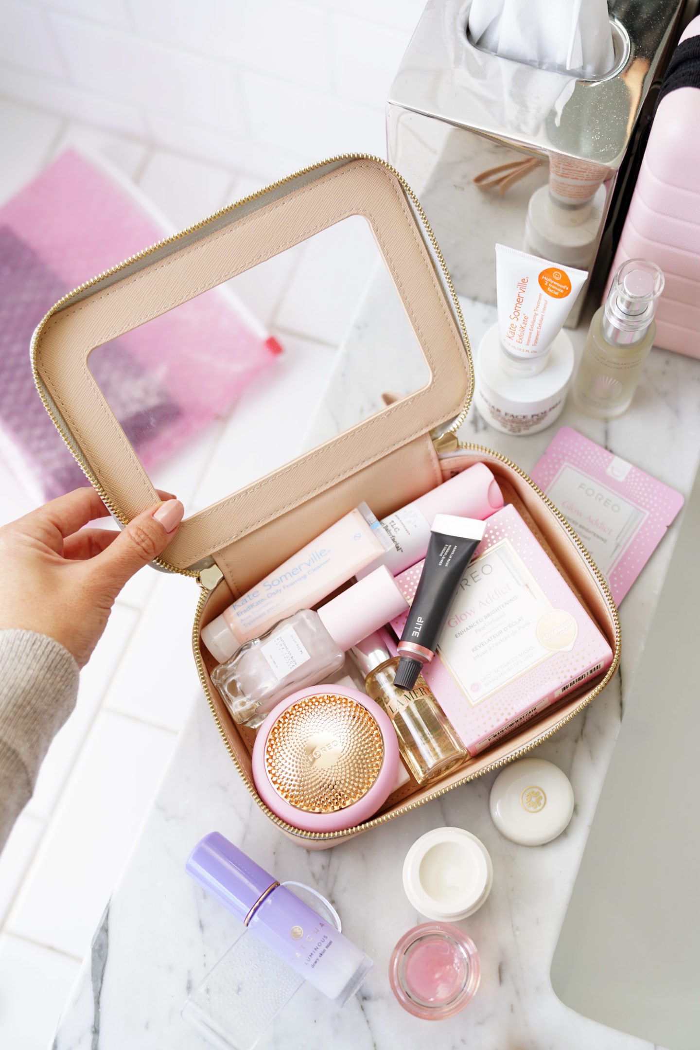 Travel Skincare Essentials Bite Beauty Agave Lip Mask, Foreo UFO, Kate Somerville Eradikate Cleanser