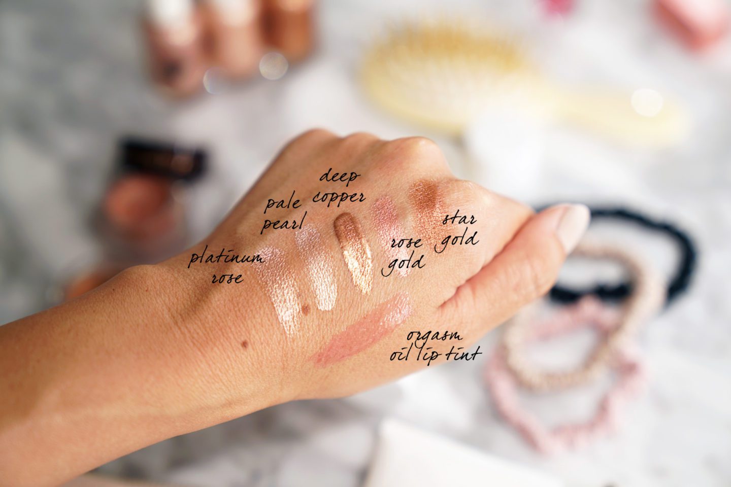 Glossier Play Niteshine, Charlotte Tilbury Rose Gold and Star Gold, NARS Orgasm Oil Tint