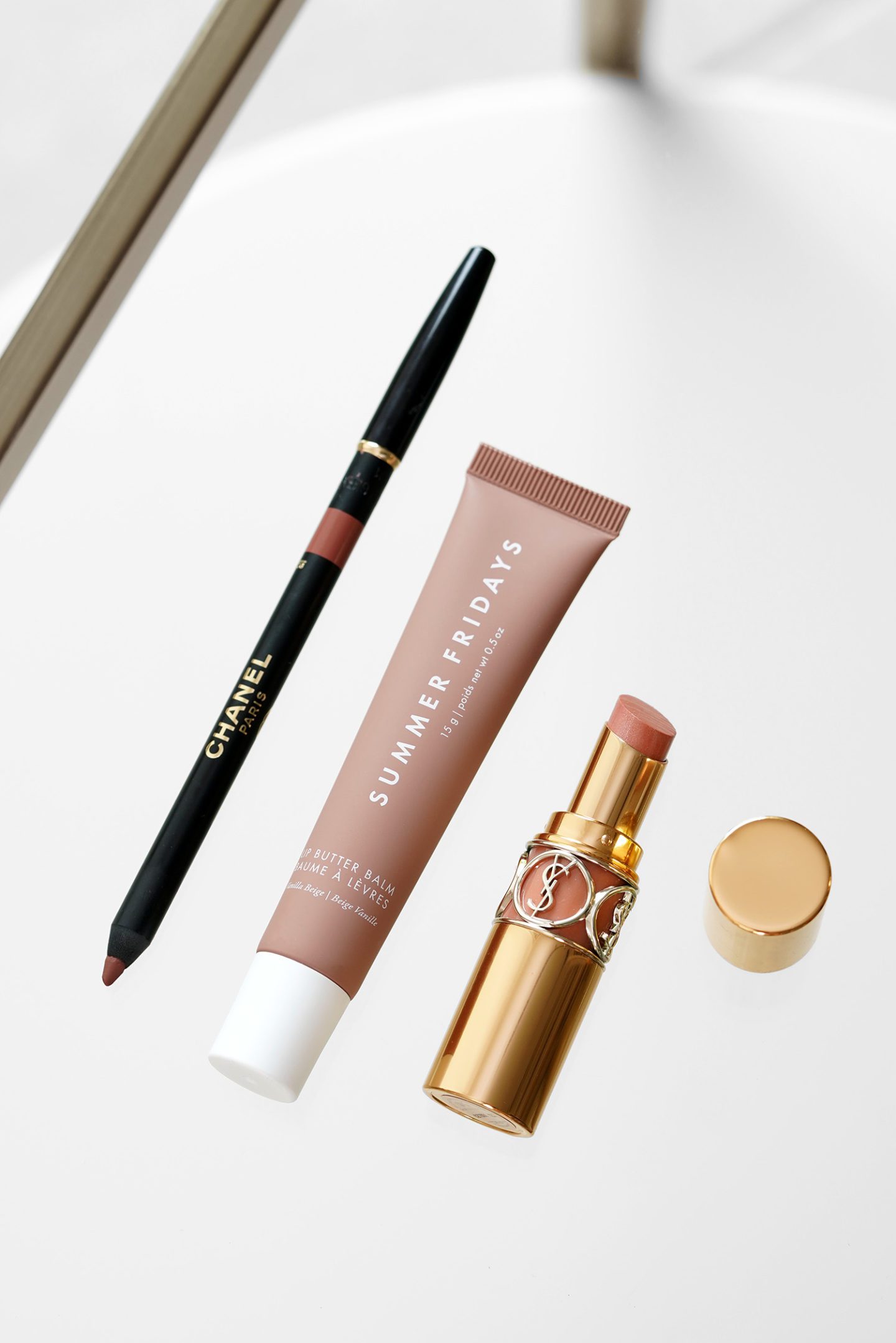 Chanel Lip Liner in Brun Nude, Summer Fridays Lip Balm Vanilla Beige, YSL Rouge Volupte Shine 123