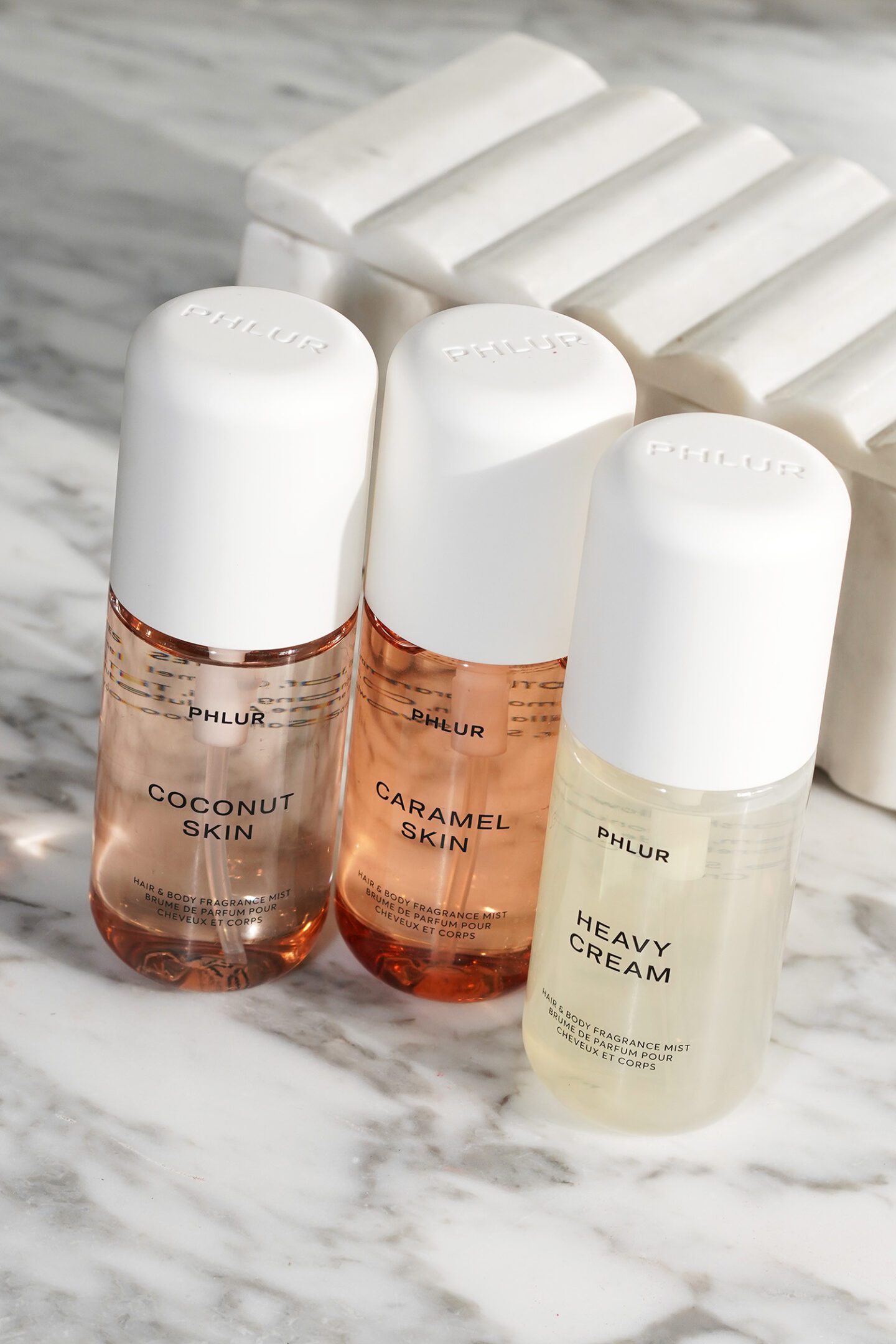 Phlur Hair and Body Mist Coconut Skin, Caramel Skin and Heavy Cream